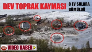 8 ev bir anda toprakla birlikte suların içine kaydı
