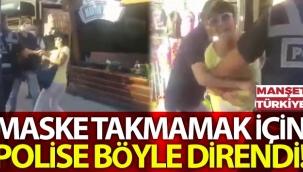 Maske takmamak için direndi
